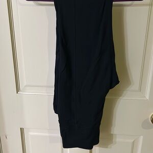 Skechers.  Small black.  2 front pockets.  2 back pockets.